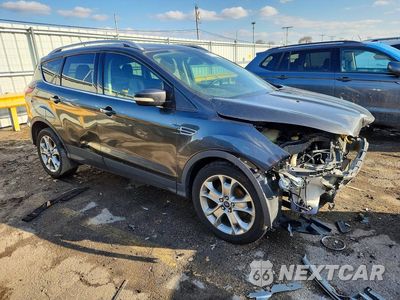 Czwarte zdjęcie samochodu z boku: 2015 FORD ESCAPE TITANIUM VIN:1FMCU0JX1FUB04815 - miniatura