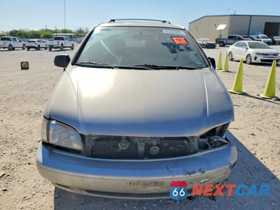 Piąte zdjęcie samochodu w środku: 2000 TOYOTA SIENNA XLE VIN:4T3ZF13C2YU272011 - miniatura