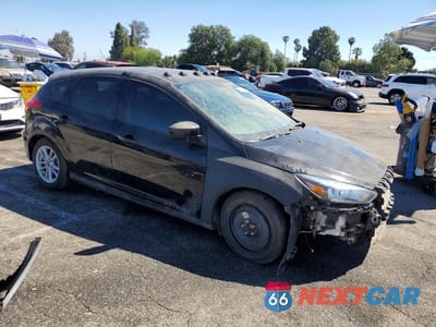 Czwarte zdjęcie samochodu z boku: 2018 FORD FOCUS SE VIN:1FADP3K27JL287548 - miniatura