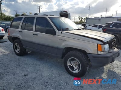 Czwarte zdjęcie samochodu z boku: 1995 JEEP GRAND CHEROKEE LAREDO VIN:1J4GZ58S1SC598053 - miniatura