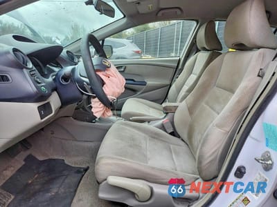 Zdjęcie 7 z 12 samochodu: 2010 HONDA INSIGHT EX VIN:JHMZE2H74AS032587 - miniatura