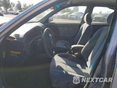Zdjęcie 7 z 12 samochodu: 2004 HYUNDAI ELANTRA GLS VIN:KMHDN46D44U730556 - miniatura