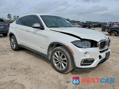 Czwarte zdjęcie samochodu z boku: 2019 BMW X6 SDRIVE35I VIN:5UXKU0C52K0S97665 - miniatura