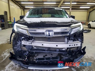 Piąte zdjęcie samochodu w środku: 2021 HONDA PILOT TOURING VIN:5FNYF6H99MB033092 - miniatura