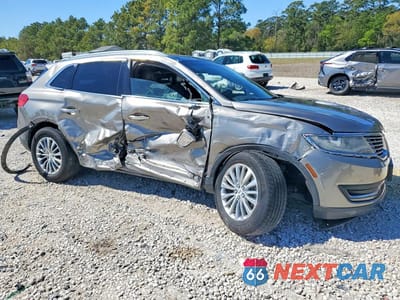 Czwarte zdjęcie samochodu z boku: 2017 LINCOLN MKX SELECT VIN:2LMPJ8KP0HBL14780 - miniatura
