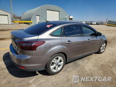 Trzecie zdjęcie samochodu z tyłu: 2014 FORD FOCUS SE VIN:1FADP3F24EL209034 - miniatura