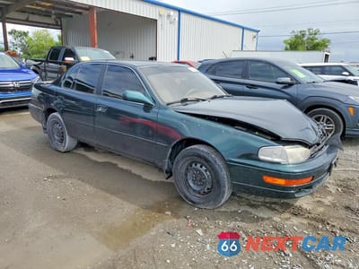 Czwarte zdjęcie samochodu z boku: 1993 TOYOTA CAMRY LE VIN:4T1SK12E8PU323597 - miniatura