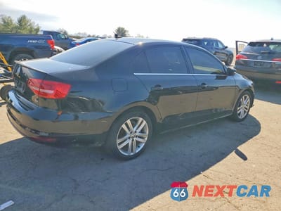 Trzecie zdjęcie samochodu z tyłu: 2015 VOLKSWAGEN JETTA TDI VIN:3VWLA7AJ7FM235265 - miniatura
