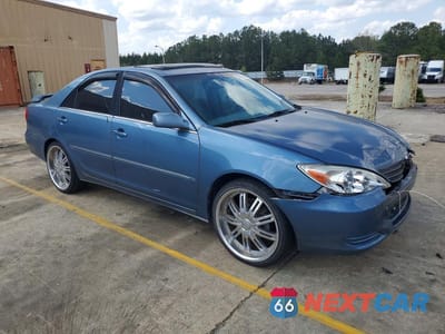 Czwarte zdjęcie samochodu z boku: 2002 TOYOTA CAMRY XLE V6 VIN:4T1BF30K32U537141 - miniatura