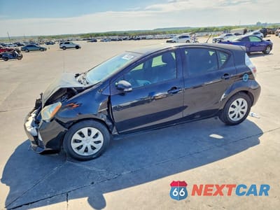 2014 TOYOTA PRIUS C TWO JTDKDTB30E1565002 - główne zdjęcie licytacji z USA - miniatura