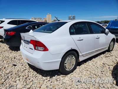 Trzecie zdjęcie samochodu z tyłu: 2011 HONDA CIVIC HYBRID VIN:JHMFA3F28BS000402 - miniatura