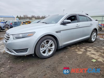 2015 FORD TAURUS SEL 1FAHP2E82FG105332 - główne zdjęcie licytacji z USA - miniatura