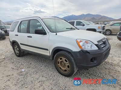 Czwarte zdjęcie samochodu z boku: 2005 HONDA CR-V LX VIN:JHLRD68505C016738 - miniatura