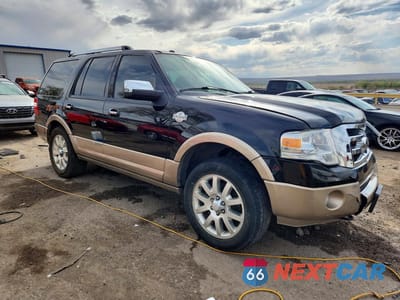 Czwarte zdjęcie samochodu z boku: 2014 FORD EXPEDITION XLT VIN:1FMJU1J54EEF17493 - miniatura