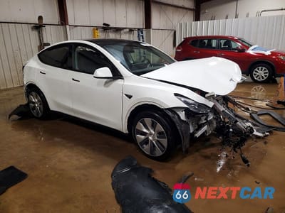 Czwarte zdjęcie samochodu z boku: 2023 TESLA MODEL Y VIN:7SAYGDEE7PF837725 - miniatura