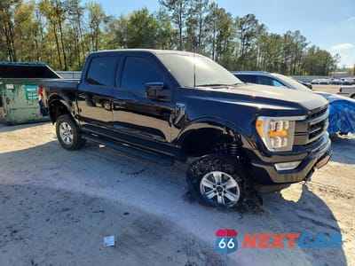 Czwarte zdjęcie samochodu z boku: 2022 FORD F150 SUPERCREW VIN:1FTFW1E52NKD60692 - miniatura
