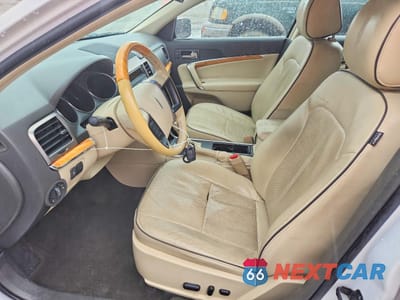 Zdjęcie 7 z 13 samochodu: 2012 LINCOLN MKZ VIN:3LNHL2GC6CR802817 - miniatura