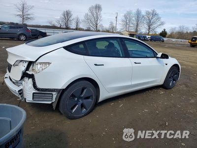 Trzecie zdjęcie samochodu z tyłu: 2023 TESLA MODEL 3 VIN:5YJ3E1EA8PF510419 - miniatura