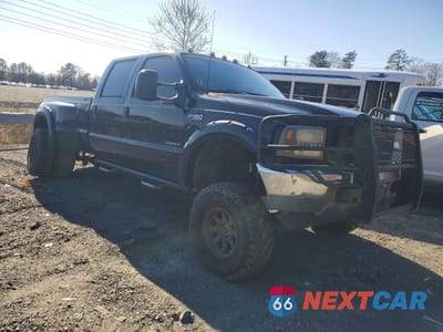 Czwarte zdjęcie samochodu z boku: 2001 FORD F350 SUPER DUTY VIN:1FTWW33F11EC16096 - miniatura