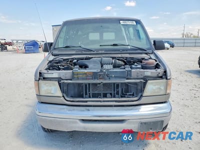Piąte zdjęcie samochodu w środku: 2001 FORD ECONOLINE E350 SUPER DUTY WAGON VIN:1FBSS31S61HA19390 - miniatura
