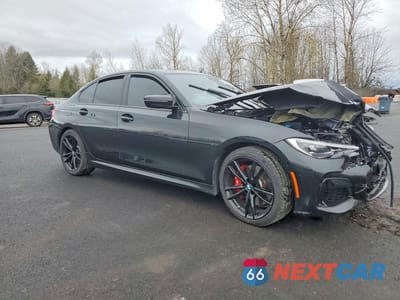 Czwarte zdjęcie samochodu z boku: 2021 BMW M340I VIN:3MW5U7J07M8B53324 - miniatura