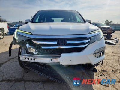 Piąte zdjęcie samochodu w środku: 2018 HONDA PILOT EXLN VIN:5FNYF6H77JB069082 - miniatura