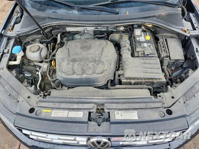 Zdjęcie 12 z 13 samochodu: 2018 VOLKSWAGEN TIGUAN VIN:3VV2B7AX2JM075211 - miniatura