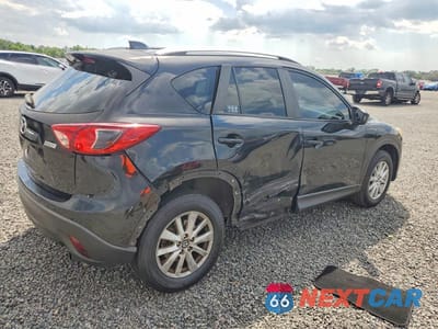Trzecie zdjęcie samochodu z tyłu: 2014 MAZDA CX-5 TOURING VIN:JM3KE2CY4E0335591 - miniatura