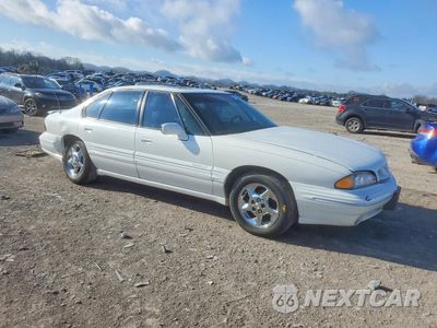 Czwarte zdjęcie samochodu z boku: 1999 PONTIAC BONNEVILLE SE VIN:1G2HX52K2XH233680 - miniatura