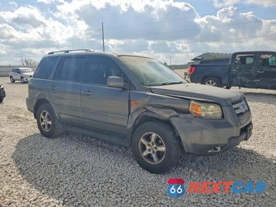 Czwarte zdjęcie samochodu z boku: 2007 HONDA PILOT EXL VIN:5FNYF28747B019399 - miniatura