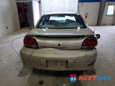 Zdjęcie 6 z 11 samochodu: 1998 PONTIAC GRAND AM SE VIN:1G2NE52T9WM500188 - miniatura