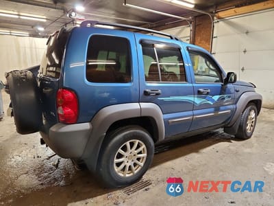 Trzecie zdjęcie samochodu z tyłu: 2004 JEEP LIBERTY SPORT VIN:1J4GL48K14W185031 - miniatura