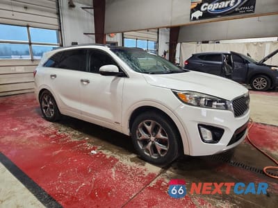 Czwarte zdjęcie samochodu z boku: 2016 KIA SORENTO SX V6 VIN:5XYPKDA50GG016701 - miniatura