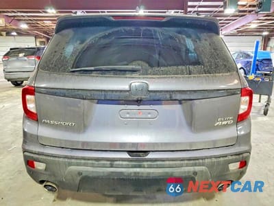 Zdjęcie 6 z 12 samochodu: 2021 HONDA PASSPORT ELITE VIN:5FNYF8H01MB036436 - miniatura