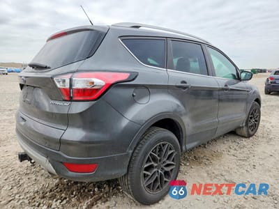 Trzecie zdjęcie samochodu z tyłu: 2018 FORD ESCAPE TITANIUM VIN:1FMCU9J93JUD29932 - miniatura