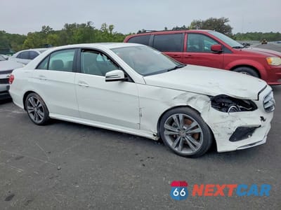 Czwarte zdjęcie samochodu z boku: 2015 MERCEDES-BENZ E 350 VIN:WDDHF5KB0FB150125 - miniatura