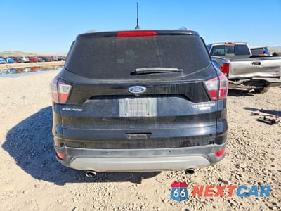 Zdjęcie 6 z 12 samochodu: 2017 FORD ESCAPE TITANIUM VIN:1FMCU9J98HUE47727 - miniatura