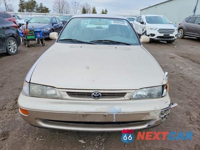 Piąte zdjęcie samochodu w środku: 1996 TOYOTA COROLLA DX VIN:2T1BB02E0TC147585 - miniatura