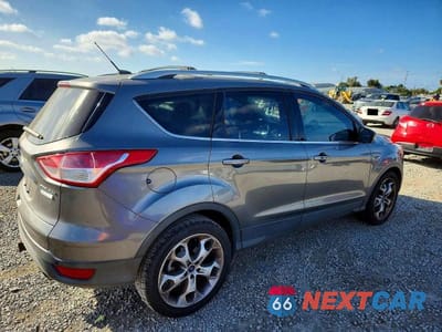 Trzecie zdjęcie samochodu z tyłu: 2014 FORD ESCAPE TITANIUM VIN:1FMCU0J97EUE13530 - miniatura