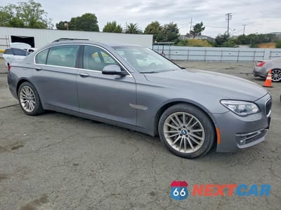 Czwarte zdjęcie samochodu z boku: 2014 BMW 750 LI VIN:WBAYE8C52ED135424 - miniatura