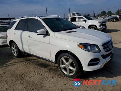 Czwarte zdjęcie samochodu z boku: 2016 MERCEDES-BENZ GLE 350 4MATIC VIN:4JGDA5HB5GA670645 - miniatura