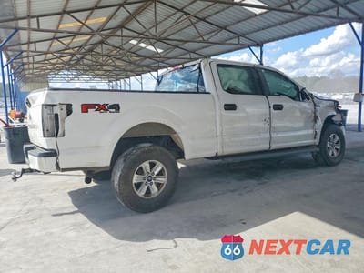 Trzecie zdjęcie samochodu z tyłu: 2018 FORD F150 SUPERCREW VIN:1FTFW1E59JFE01404 - miniatura