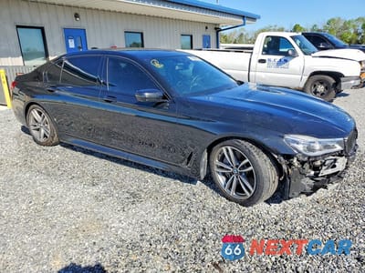 Czwarte zdjęcie samochodu z boku: 2019 BMW 750 XI VIN:WBA7F2C5XKB240502 - miniatura
