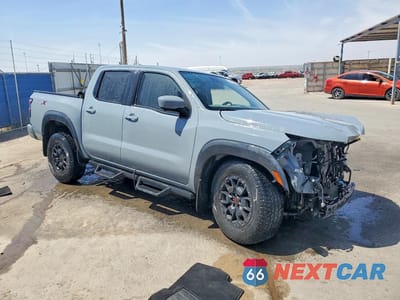 Czwarte zdjęcie samochodu z boku: 2023 NISSAN FRONTIER PRO-X VIN:1N6ED1EJXPN609978 - miniatura