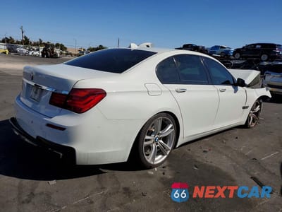 Trzecie zdjęcie samochodu z tyłu: 2013 BMW 740 I VIN:WBAYA6C56DD143380 - miniatura