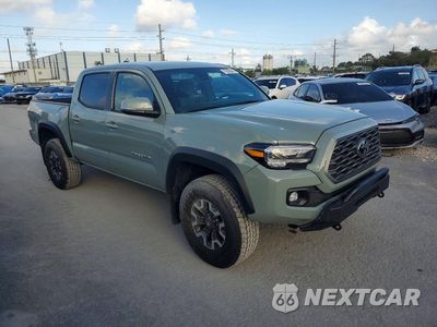 Czwarte zdjęcie samochodu z boku: 2023 TOYOTA TACOMA TRD OFF-ROAD VIN:3TYCZ5AN7PT174721 - miniatura