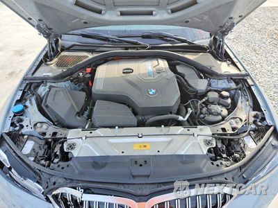 Zdjęcie 11 z 12 samochodu: 2023 BMW 330E VIN:3MW39FF03P8C97629 - miniatura