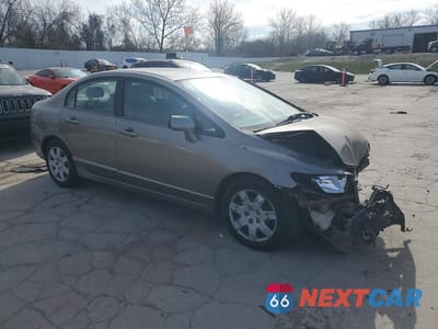Czwarte zdjęcie samochodu z boku: 2006 HONDA CIVIC LX VIN:1HGFA165X6L027151 - miniatura