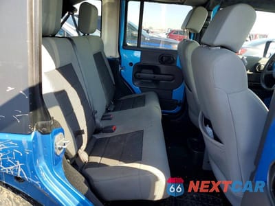Zdjęcie 10 z 12 samochodu: 2010 JEEP WRANGLER UNLIMITED SPORT VIN:1J4HB3H15AL214469 - miniatura