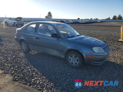 Czwarte zdjęcie samochodu z boku: 2003 HYUNDAI ACCENT BASE VIN:KMHCF35C63U271055 - miniatura